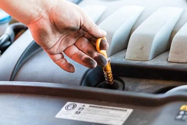 Процесс заливки нового масла и контроль уровня