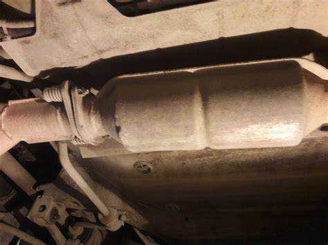 Отсоединение патрубков и фланцев от выхлопного коллектора